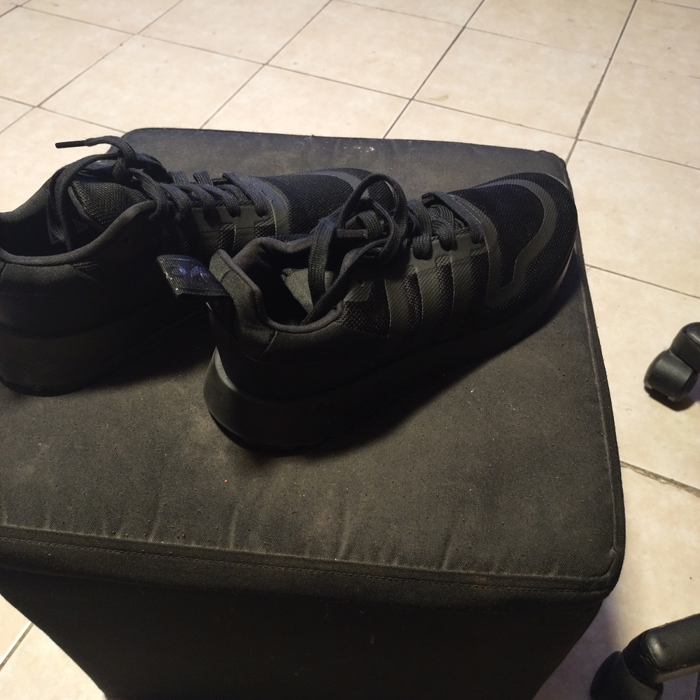 Black Adidas sneakers